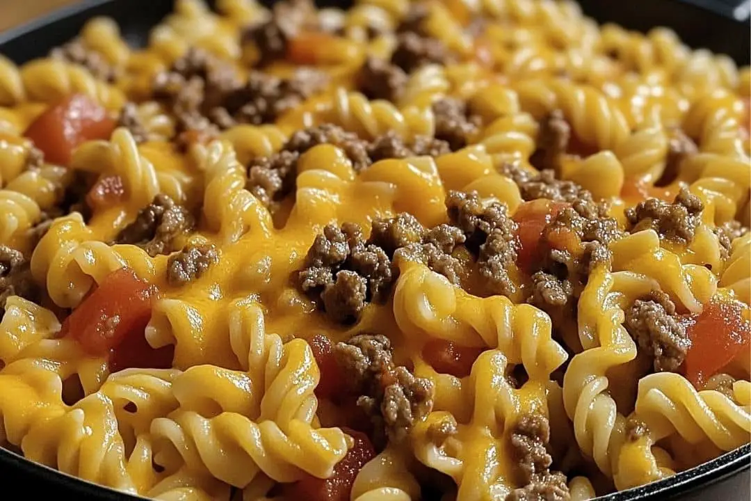 This Cheesy Beef Taco Pasta combines the rich flavors of taco seasoning with the creamy goodness of Velveeta and cheddar cheese. It’s a hearty and satisfying dish that's perfect for weeknight dinners or gatherings with friends and family!