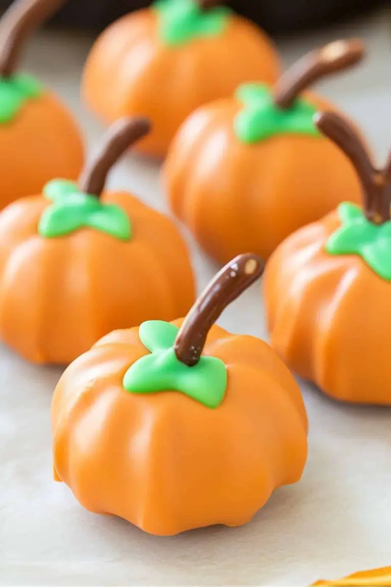 These Pumpkin Oreo Balls are the perfect no-bake Halloween treat! Made with crushed Oreo cookies, cream cheese, and coated in orange candy melts, they’re easy to make and deliciously festive. Perfect for parties!